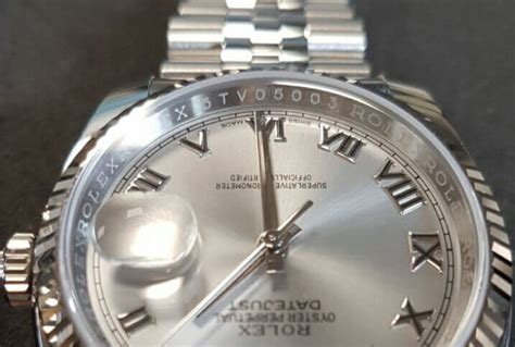 Rolex serial number inside bezel